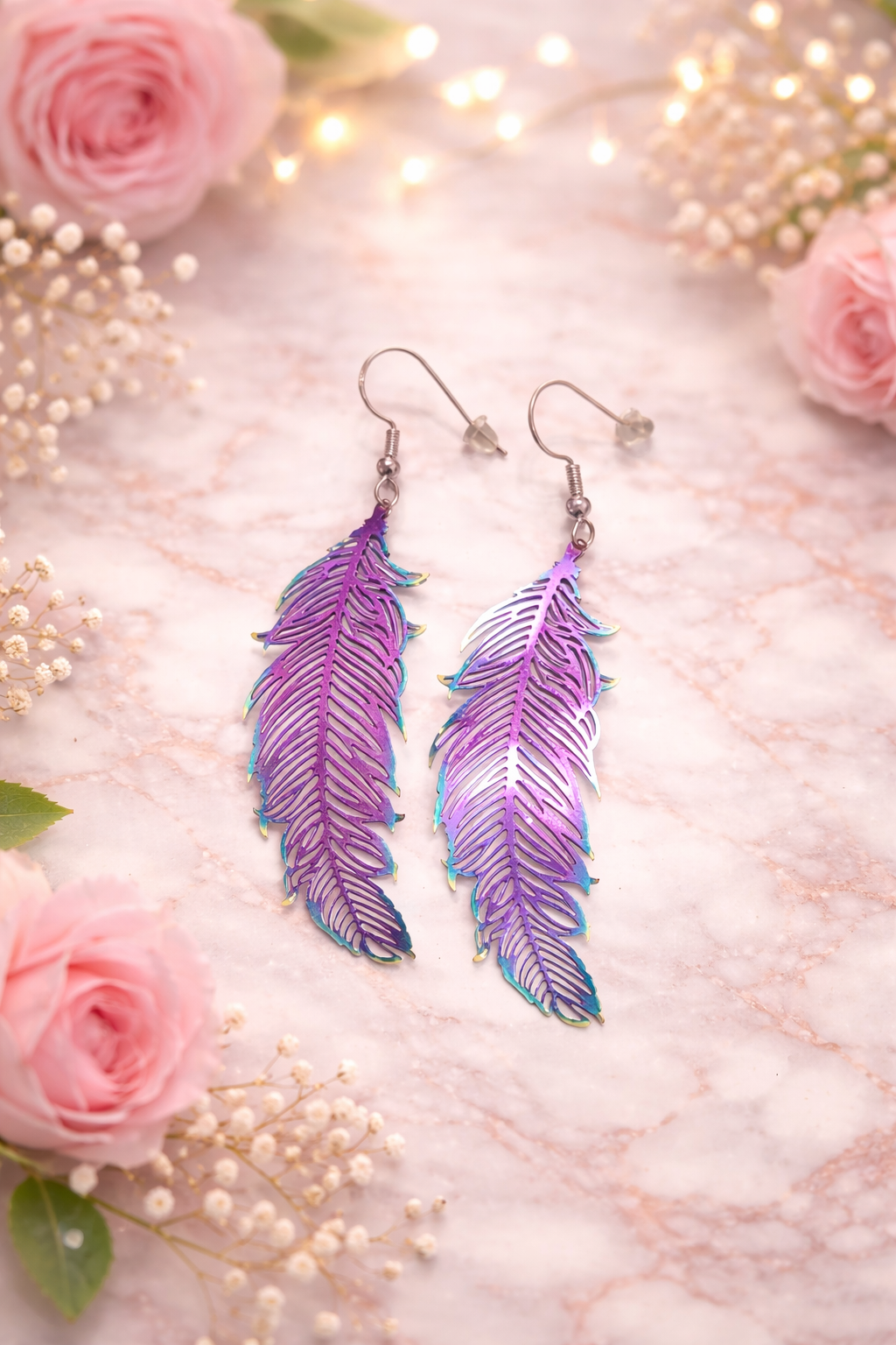Boucles d'oreilles plumes holographiques